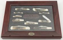 Wooden Cased Set of  "W.R. Case & Sons Cutlery" marked Folding Knives. Plaque in center of collectio