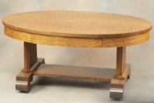 Beautiful antique quarter sawn oak oval Coffee Table, circa 1910, 44" oval top with drawered skirt a