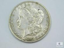 1882-O XF Morgan Dollar With Small Lamination At Date