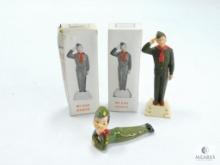 Lot of Four Boy Scout Statuettes