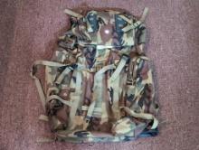 (DEN) MAGNUM BRAND CAMO HIKING/HUNTING BACKPACK. LIGHTLY USED CONDITION.