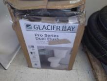 Glacier Bay 12 inch Rough In Two-Piece 1.1 GPF/1.6 GPF Dual Flush Round Toilet in White Seat