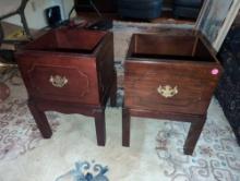 (UPOFC) PAIR OF BOMBAY & COMPANY WOOD PLANT BOXES ON STANDS. BOTH HAVE BRASS HANDLES. THEY MEASURE