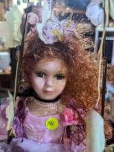 (GAR) Cathay Collection Porcelain String Puppet, Red Haired and Green Eyed Doll with Purple Dress