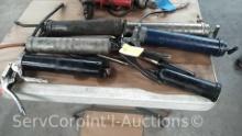 Lot on Table of 6 Various Grease Guns