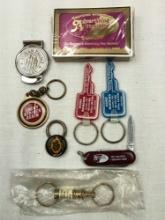 MISC ADVERTISING ITEMS, DECK OF CARDS, KEY RINGS MONEY CLIP, SMALL POCKET KNIFE.