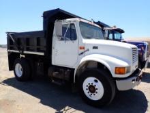 1999 INTERNATIONAL 4700 DUMP TRUCK, 20,020+ mi showing,  DT466E DIESEL, 5 +