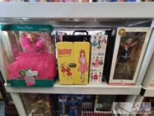 (10) Barbie Dolls and (5) Doll Cases