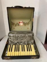 Vintage accordion in case