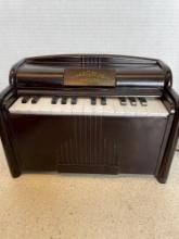 Magnus mini organ, electric, works fine, Bakelite case