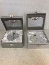 2 Waterford crystal snowflakes in boxes with paperwork