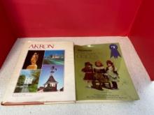 Two books on Akron and dolls