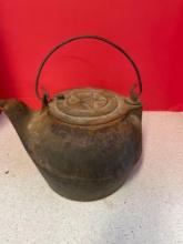 Antique cast-iron number eight star teapot