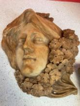 Antique Woman?s face hand carved out of wood