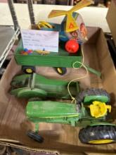John Deere Steel toys, tractor, manure spreader, cart, plus mini captor toy and airplanes