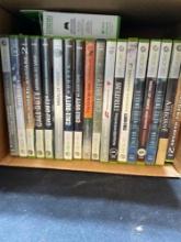 2 XBOX 360 game systems with 18 games