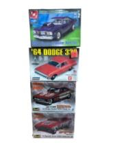 Four Classic Car Plastic Model Kits by Various Makers Dodge and Plymouth