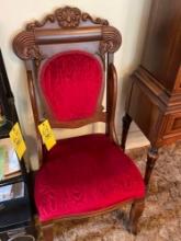 Victorian style red velvet wooden chair on wheels