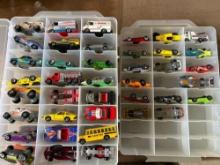 2 doubled sided cases with assorted cars
