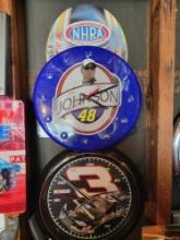 NHRA sign, Earnhardt and Jimmy Johnson batt op clocks