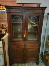 Antique Jacobean dark oak cupboard with glass doors