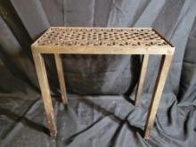 Homemade small side table with cut out grate top