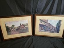Pair of English village street themed framed prints