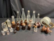 vintage glass bottles and porcelain insulators