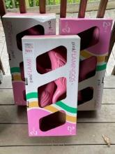 3 boxes of pink flamingos