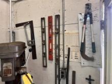 LOT OF ASSORTED HAND TOOLS ALONG WALL