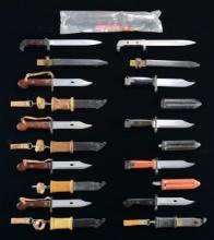 LOT OF ASSORTED AK BAYONETS WITH SCABBARDS.